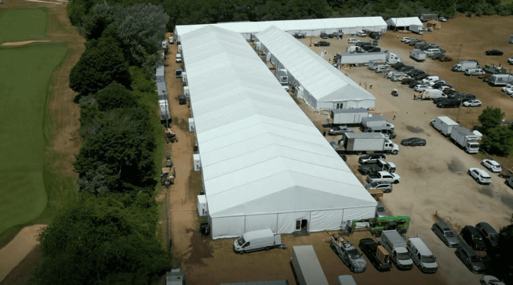 Aerial view of a long clearspan structure tent installed for a corporate event