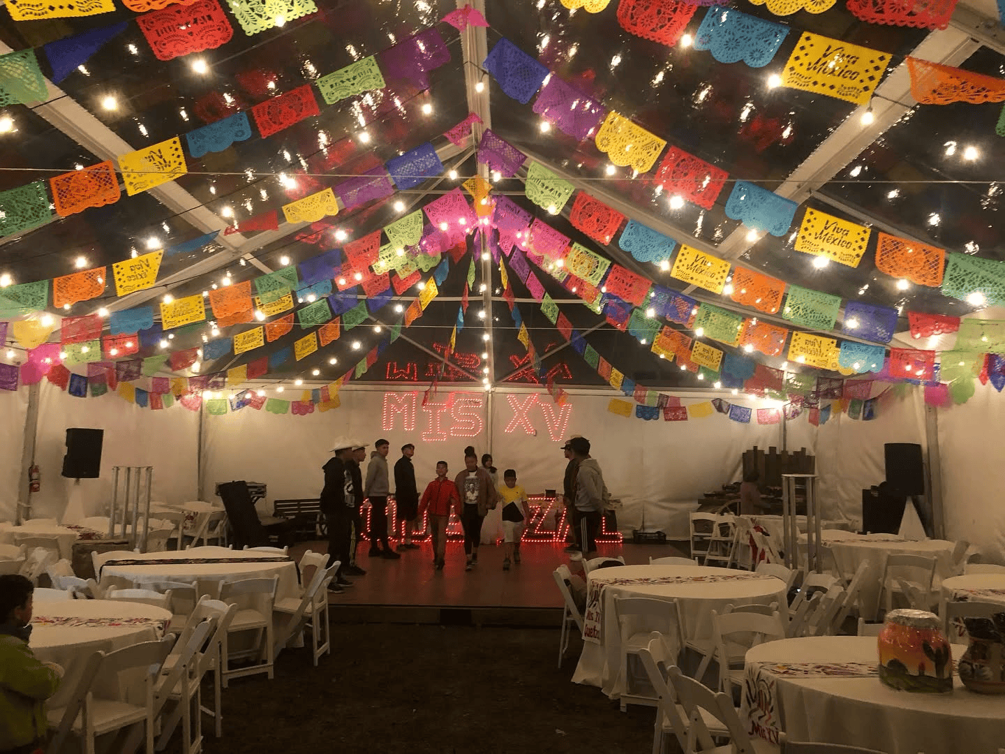 Private party setup with seating and a bar area
