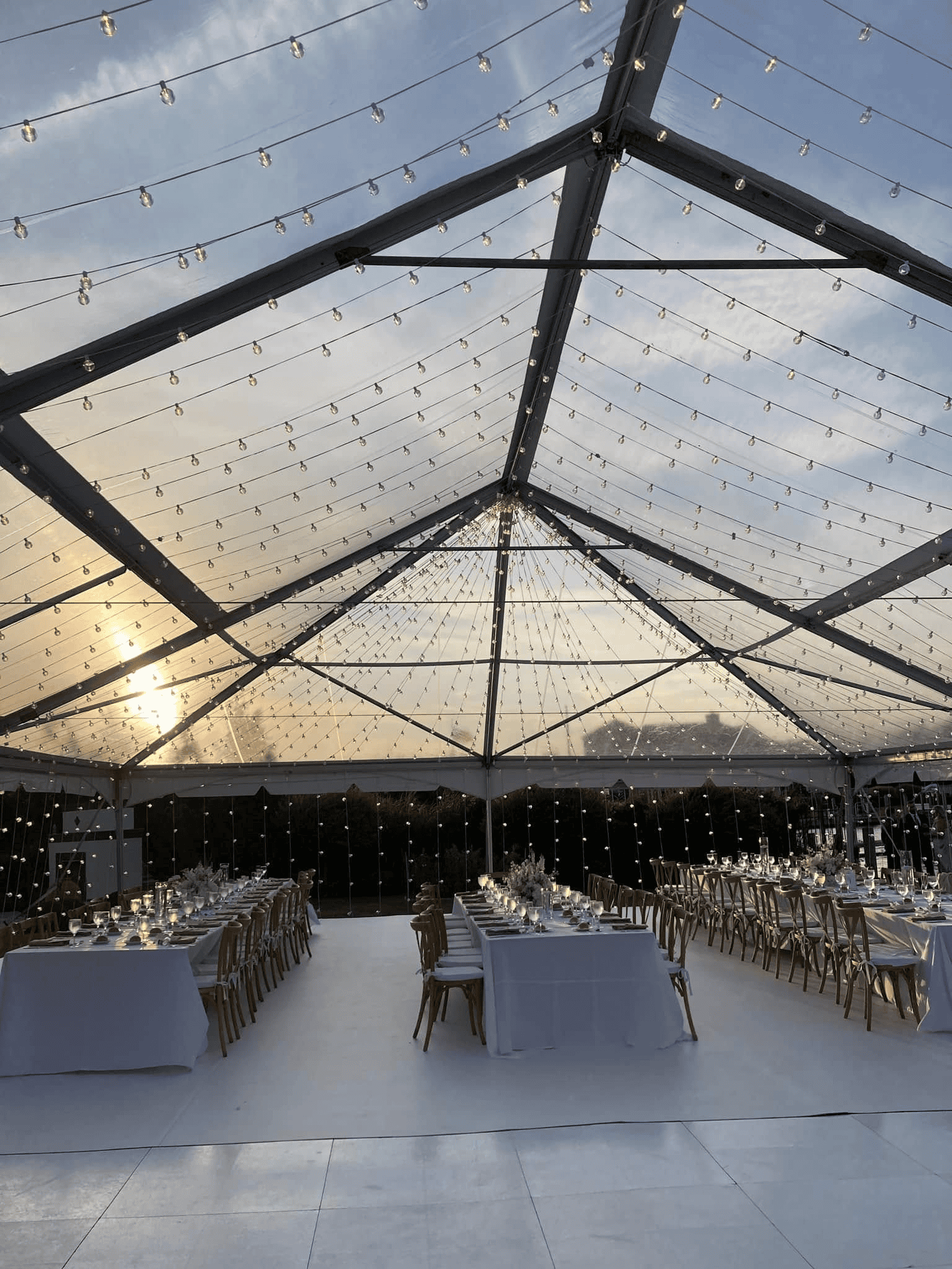 Clear top tent lit in the evening
