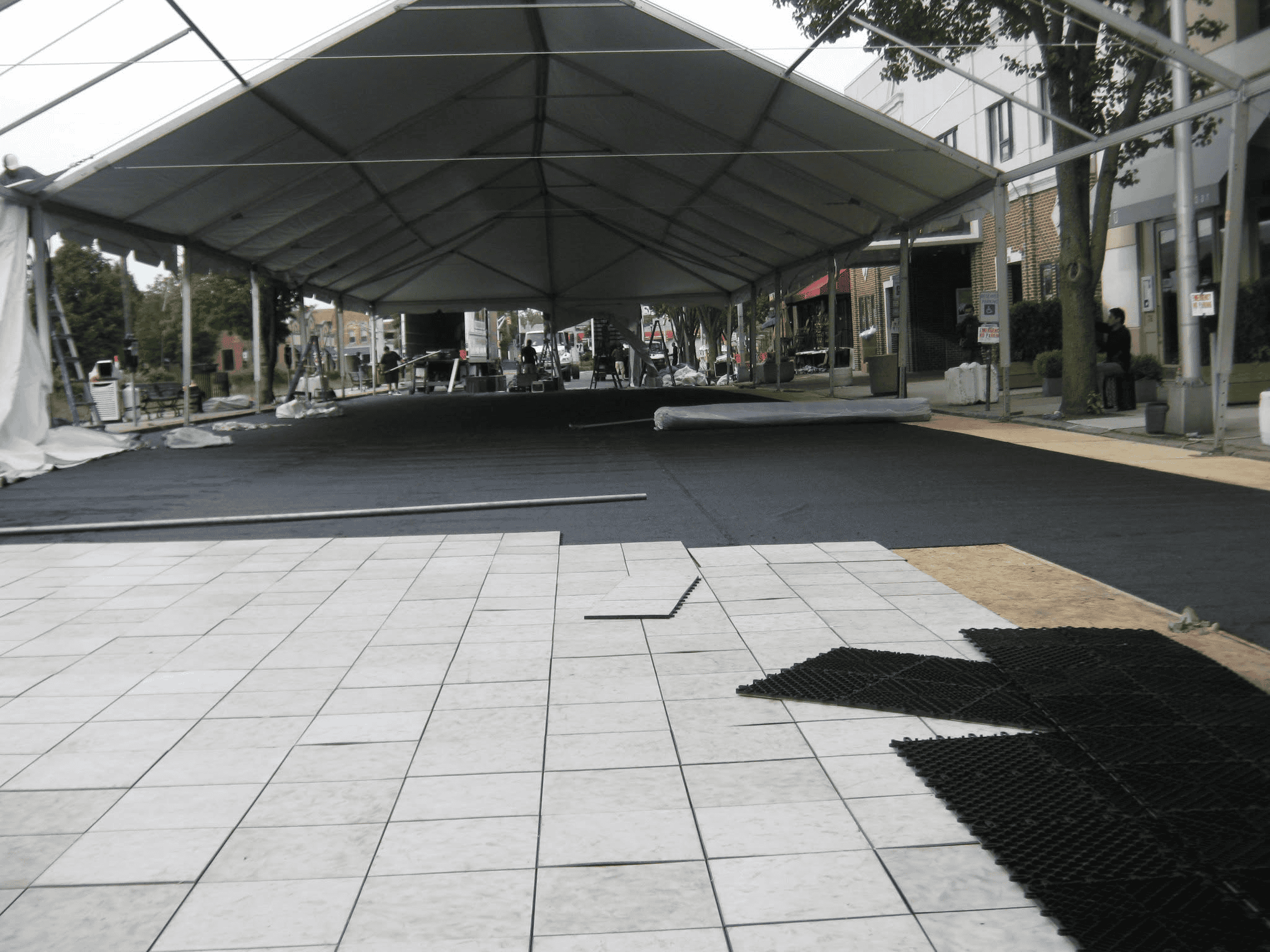 Perimeter legs running the length of a large event tent